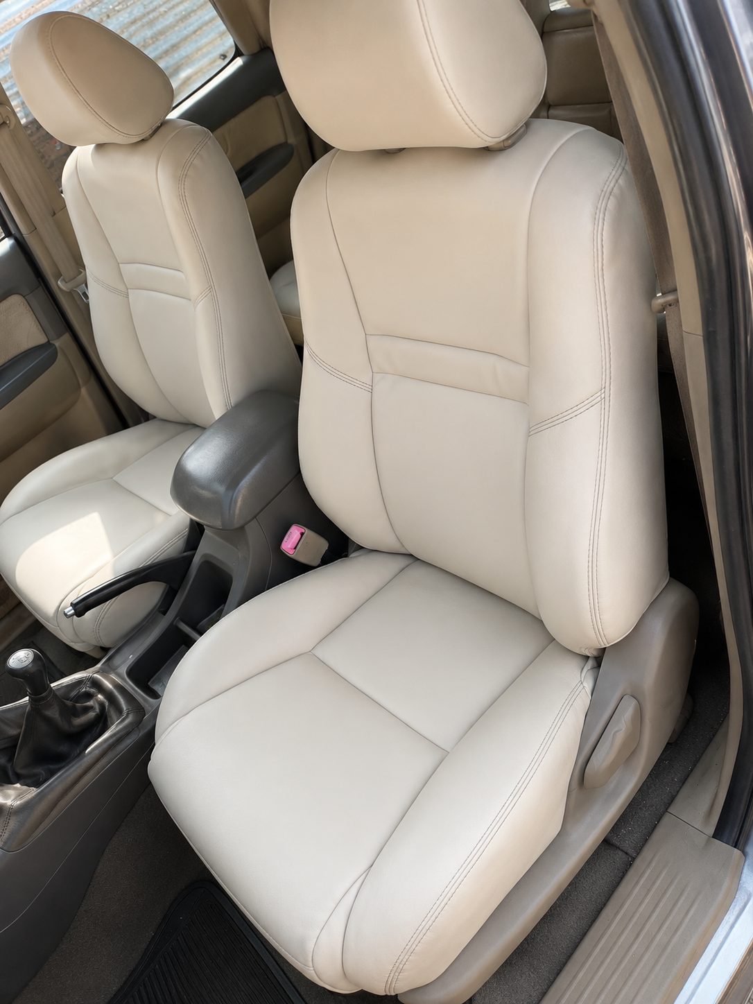 Cream leather seats fitted back in the car